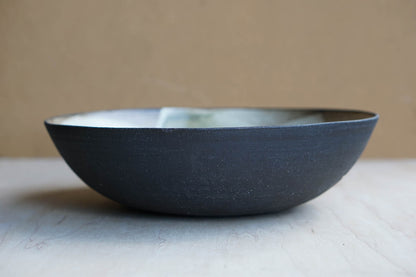 Big black serving bowl