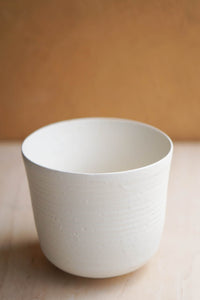 white bucket vase