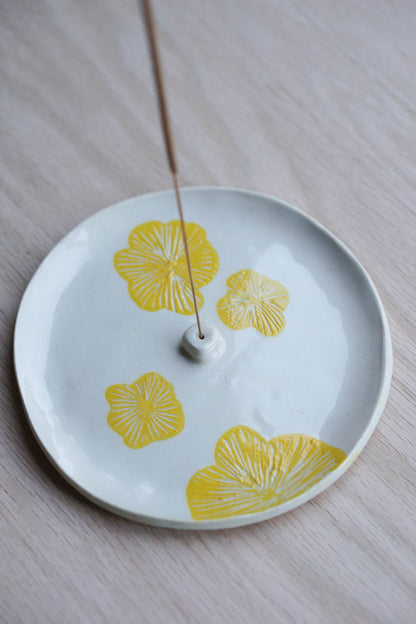 Yellow flower incense holder